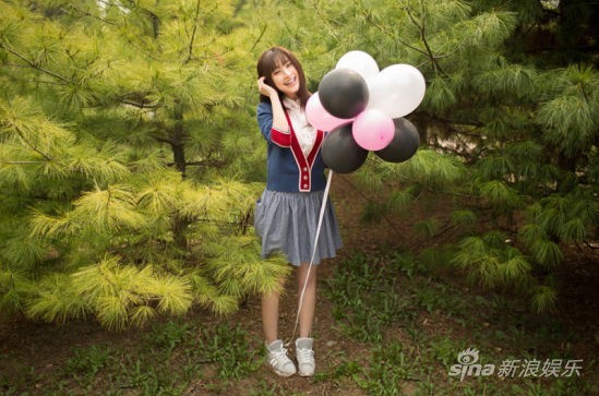 張儷清新寫(xiě)真如鄰家少女